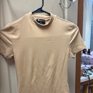 This, soft as butter bodysuit is NWT